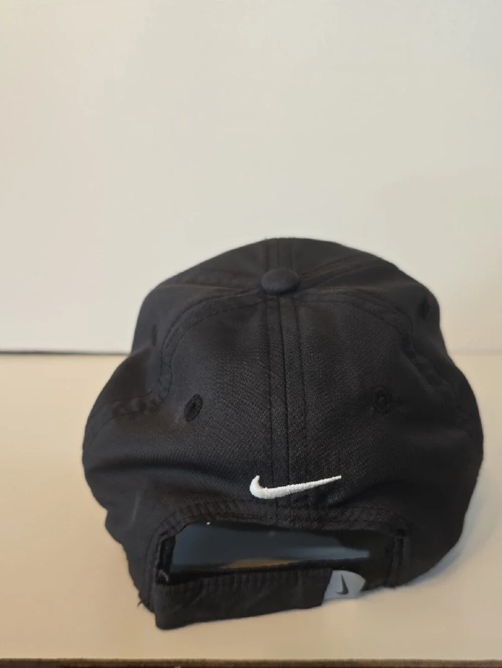 Nike Black Cap with White Swoosh Logo